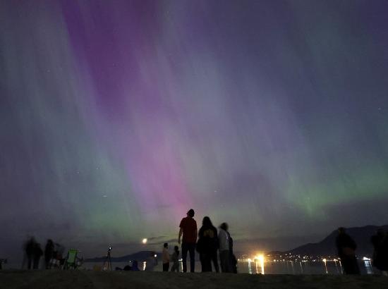 Solar storm puts on brilliant light show across the globe, no serious problems reported