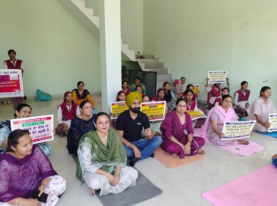Teachers and students sensitize voters at Yoga Training Centre, Khadoor Sahib 