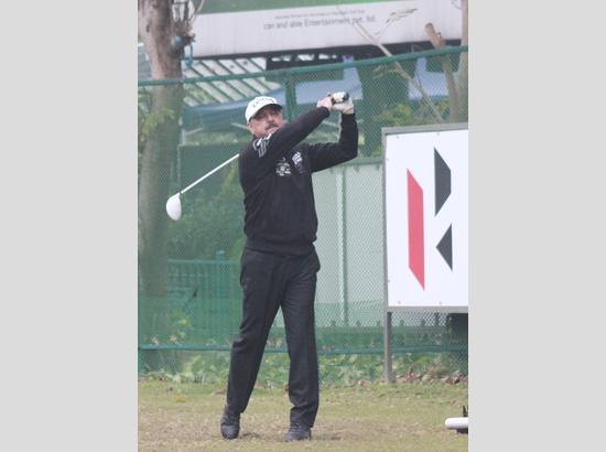 Manjot Singh (P) and his team lift the Pro Amateur Silver Jubilee CGA Golf Cup in professional category at Chandigarh Golf Club