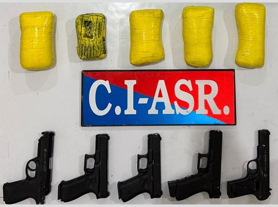 Two involved in cross-border smuggling module held with 2.5 kg heroin, 5 pistols
