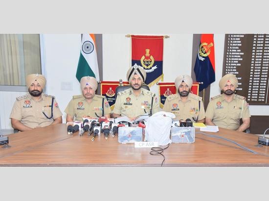 Four linked to cross-border drug and arms smuggling network held in Amritsar; 5.5 kg heroin, two pistols recovered