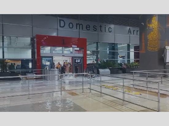 Breaking: Waterlogging at Delhi Airport Terminal 3 after hour-long rain; Passengers wade through water