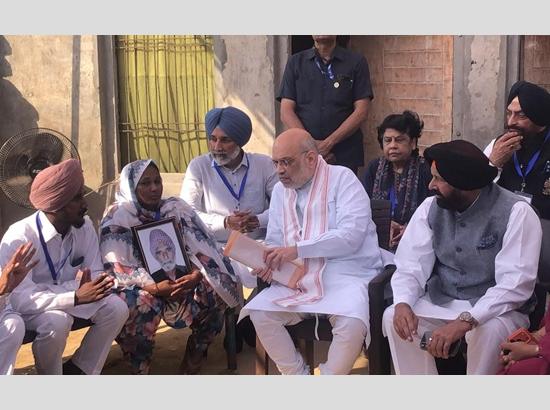 Breaking: Amit Shah meets deceased Gulzar Singh’s family in Sangrur village