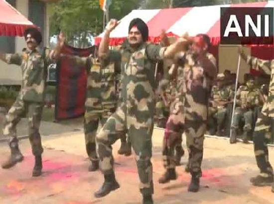 BSF personnel celebrate Holi at borders in West Bengal, Punjab, and Tripura