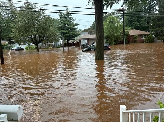 Flood Chaos in US: Indian family abandons car, escapes With only documents, laptop on way to airport