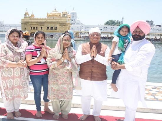 MP Chaudhary Santokh Singh along with family pays obeisance at Darbar Sahib, Ram Tirath an