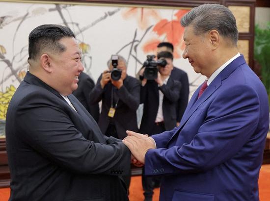 China's President Xi arrives in North Korea on first official visit in 7 years