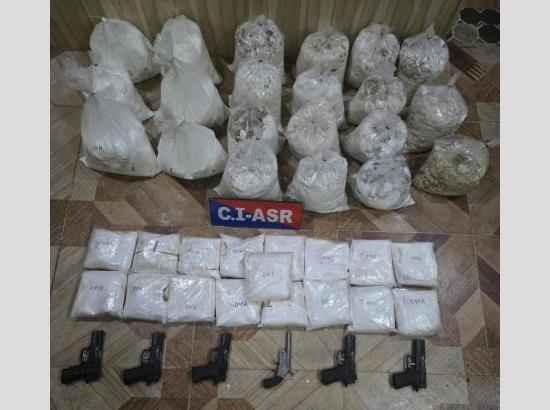 105 Kg Heroin, 31.93 Kg Caffeine Anhydrous, 17 Kg DMR, 5 foreign made Pistols & 1 Desi Katta recovered, two arrested
