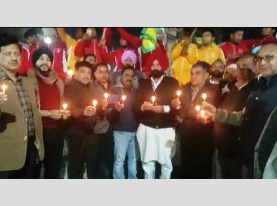 MLA Pinki joins children holding Candle March for farmers lost their lives during protest