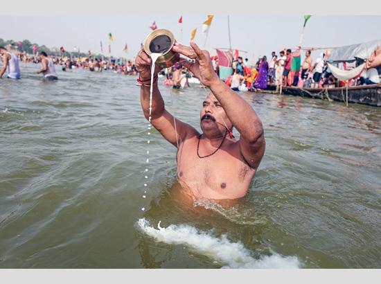 Devotees take holy dip in Triveni Sangam on Yogini Ekadashi