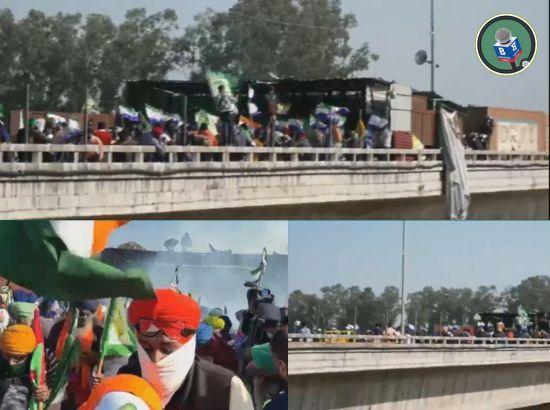 Police fire tear gas shells at farmers marching to Delhi; Watch Video