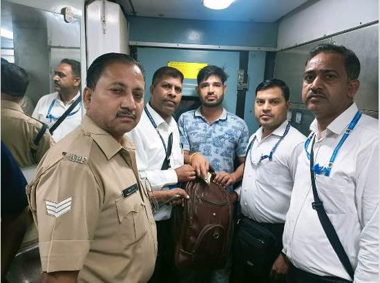 INTEGRITY PREVAILS : Alert ticket checking staff returns lost bag to passenger on train