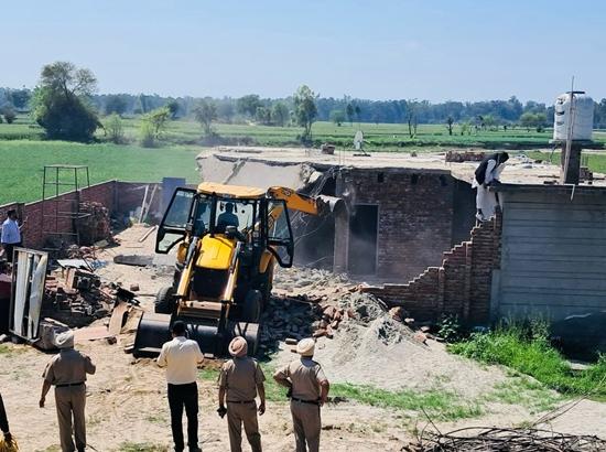 Punjab’s War on Drugs: Police demolish house of fugitive drug peddler