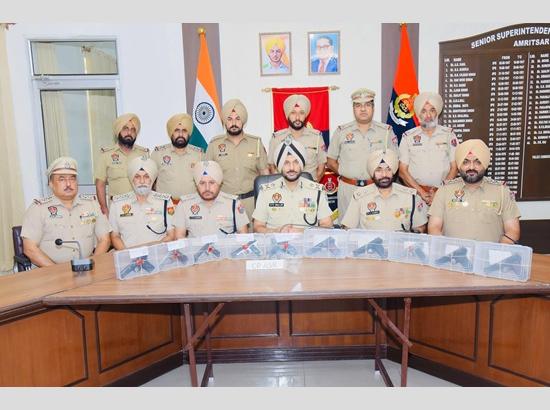 Four linked to cross-border arms smuggling networking held with 10 sophisticated pistols