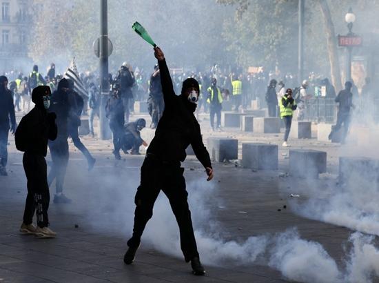 Macron vows strict action against 