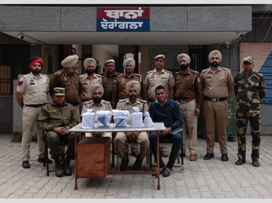 Gurdaspur Police, BSF recover drugs and arms consignment from across the border 